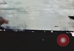 Image of USS Saratoga CV-3 struck by Kamikaze aircraft Pacific Theater, 1945, second 21 stock footage video 65675043694