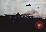 Image of USS Saratoga CV-3 struck by Kamikaze aircraft Pacific Theater, 1945, second 23 stock footage video 65675043694