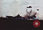 Image of USS Saratoga CV-3 struck by Kamikaze aircraft Pacific Theater, 1945, second 24 stock footage video 65675043694