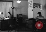 Image of office wife prepares meal Chicago Illinois USA, 1936, second 10 stock footage video 65675043759