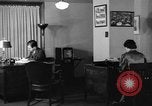 Image of office wife prepares meal Chicago Illinois USA, 1936, second 11 stock footage video 65675043759