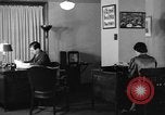 Image of office wife prepares meal Chicago Illinois USA, 1936, second 12 stock footage video 65675043759