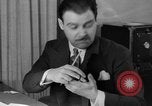 Image of office wife prepares meal Chicago Illinois USA, 1936, second 18 stock footage video 65675043759
