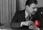 Image of office wife prepares meal Chicago Illinois USA, 1936, second 19 stock footage video 65675043759