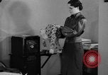 Image of office wife prepares meal Chicago Illinois USA, 1936, second 25 stock footage video 65675043759