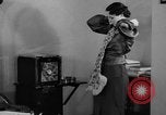 Image of office wife prepares meal Chicago Illinois USA, 1936, second 28 stock footage video 65675043759