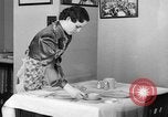 Image of office wife prepares meal Chicago Illinois USA, 1936, second 33 stock footage video 65675043759