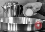 Image of office wife prepares meal Chicago Illinois USA, 1936, second 37 stock footage video 65675043759