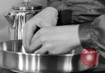 Image of office wife prepares meal Chicago Illinois USA, 1936, second 39 stock footage video 65675043759