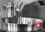 Image of office wife prepares meal Chicago Illinois USA, 1936, second 40 stock footage video 65675043759