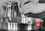 Image of office wife prepares meal Chicago Illinois USA, 1936, second 41 stock footage video 65675043759