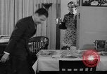 Image of office wife prepares meal Chicago Illinois USA, 1936, second 42 stock footage video 65675043759