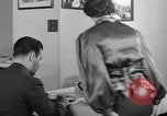 Image of office wife prepares meal Chicago Illinois USA, 1936, second 48 stock footage video 65675043759