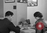 Image of office wife prepares meal Chicago Illinois USA, 1936, second 51 stock footage video 65675043759
