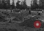 Image of German prisoners dig graves for American soldiers France, 1944, second 24 stock footage video 65675043863
