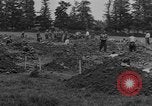 Image of German prisoners dig graves for American soldiers France, 1944, second 25 stock footage video 65675043863