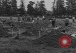 Image of German prisoners dig graves for American soldiers France, 1944, second 26 stock footage video 65675043863