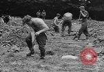 Image of German prisoners dig graves for American soldiers France, 1944, second 37 stock footage video 65675043863