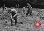 Image of German prisoners dig graves for American soldiers France, 1944, second 38 stock footage video 65675043863