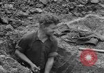 Image of German prisoners dig graves for American soldiers France, 1944, second 42 stock footage video 65675043863