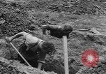 Image of German prisoners dig graves for American soldiers France, 1944, second 45 stock footage video 65675043863
