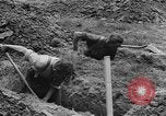 Image of German prisoners dig graves for American soldiers France, 1944, second 48 stock footage video 65675043863