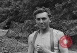 Image of German prisoners dig graves for American soldiers France, 1944, second 50 stock footage video 65675043863
