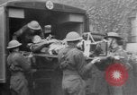 Image of wounded British soldier on stretcher United Kingdom, 1940, second 4 stock footage video 65675043882