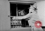 Image of wounded British soldier on stretcher United Kingdom, 1940, second 15 stock footage video 65675043882
