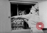 Image of wounded British soldier on stretcher United Kingdom, 1940, second 16 stock footage video 65675043882
