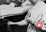 Image of wounded British soldier on stretcher United Kingdom, 1940, second 25 stock footage video 65675043882