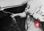 Image of wounded British soldier on stretcher United Kingdom, 1940, second 31 stock footage video 65675043882
