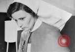 Image of wounded British soldier on stretcher United Kingdom, 1940, second 32 stock footage video 65675043882