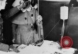 Image of wounded British soldier on stretcher United Kingdom, 1940, second 36 stock footage video 65675043882