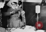 Image of wounded British soldier on stretcher United Kingdom, 1940, second 38 stock footage video 65675043882