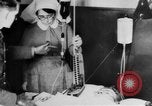 Image of wounded British soldier on stretcher United Kingdom, 1940, second 39 stock footage video 65675043882