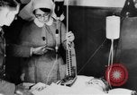 Image of wounded British soldier on stretcher United Kingdom, 1940, second 40 stock footage video 65675043882