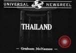 Image of ongoing parade Bangkok Thailand, 1941, second 3 stock footage video 65675043886