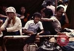 Standbild Betrieb neues Leben Vietnam, 1975, aus Sekunde 23 historischem Filmmaterial Videoclip 65675043918