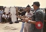 Standbild Betrieb neues Leben Vietnam, 1975, aus Sekunde 28 historischem Filmmaterial Videoclip 65675043918