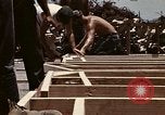 Standbild Betrieb neues Leben Vietnam, 1975, aus Sekunde 34 historischem Filmmaterial Videoclip 65675043920