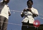 Standbild Betrieb neues Leben Guam, 1975, aus Sekunde 53 historischem Filmmaterial Videoclip 65675043922