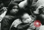 Immagine di Rifugiati cinesi Cina, 1944, secondo 36 filmato di repertorio 65675043946