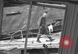 Image of damaged building Anchorage Alaska USA, 1964, second 19 stock footage video 65675044024