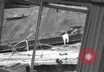 Image of damaged building Anchorage Alaska USA, 1964, second 21 stock footage video 65675044024
