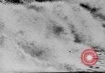Image of ocean waves on rocky shores Vietnam, 1925, second 4 stock footage video 65675044076
