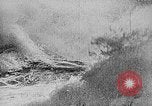 Image of ocean waves on rocky shores Vietnam, 1925, second 6 stock footage video 65675044076
