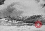 Image of ocean waves on rocky shores Vietnam, 1925, second 7 stock footage video 65675044076