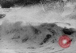 Image of ocean waves on rocky shores Vietnam, 1925, second 9 stock footage video 65675044076