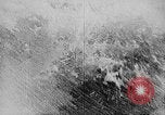 Image of ocean waves on rocky shores Vietnam, 1925, second 10 stock footage video 65675044076